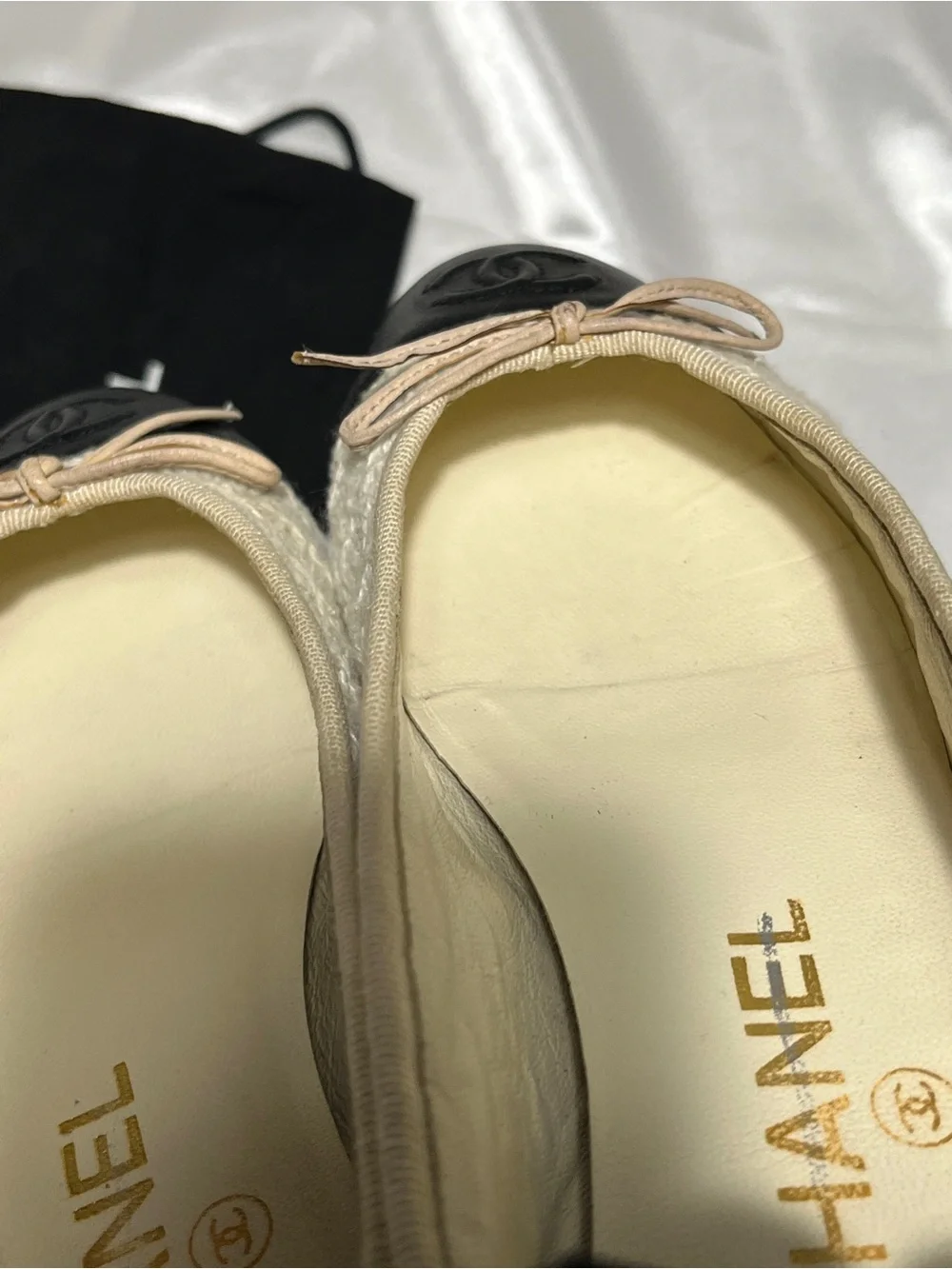 CHANEL Beige Tweed Flats with Black Cap Toe and Bow